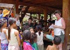 Thailand, Laos Aug02 142  Eskil donnerer lærebøger i en landsby ved Mekong floden Laos